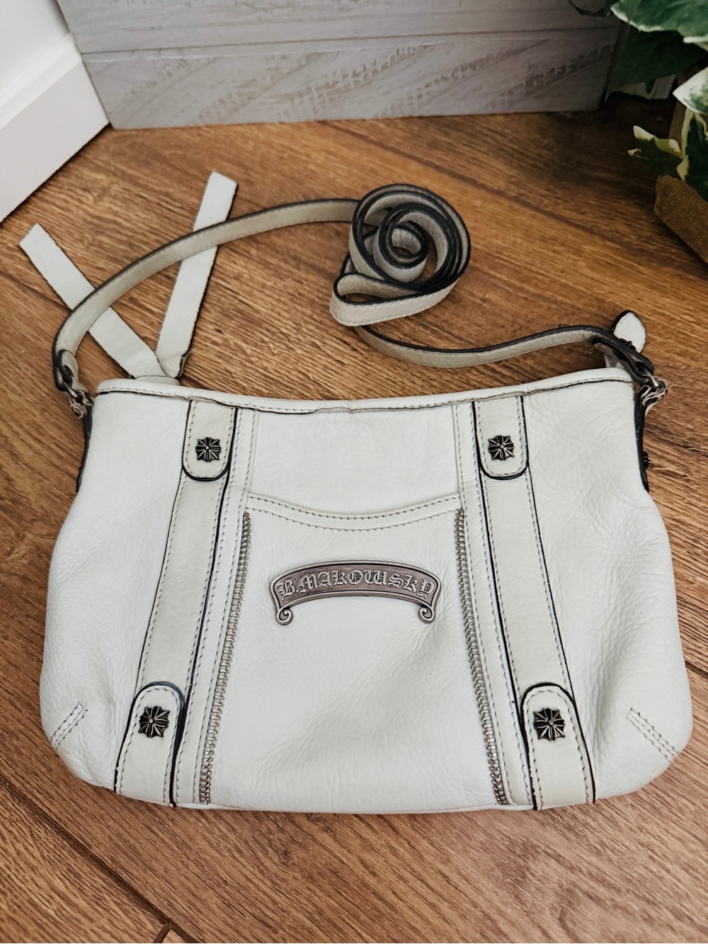 B. Makowsky Off White Leather Chrome Rocker Crossbody Bag
